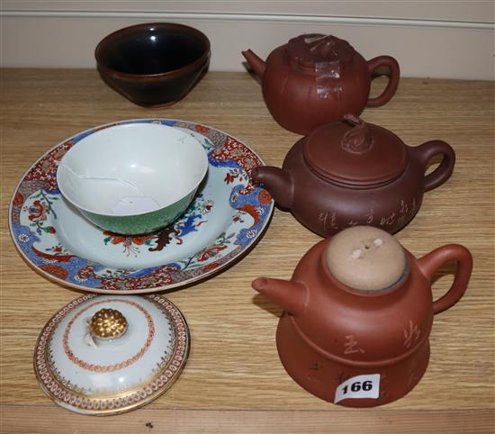 Three Yixing teapots and a hares fur bowl and another bowl, export plate and a lid.